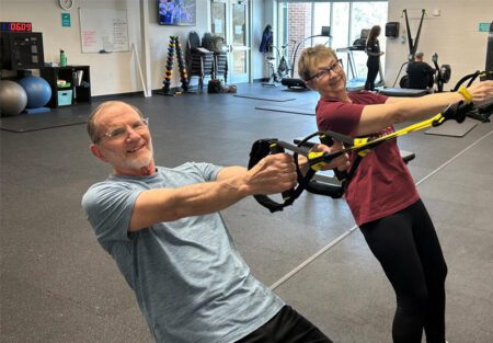 Carolyn and Mark Dewalt working out